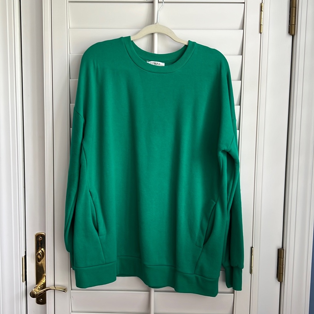 Green sweatshirt tunic with pockets